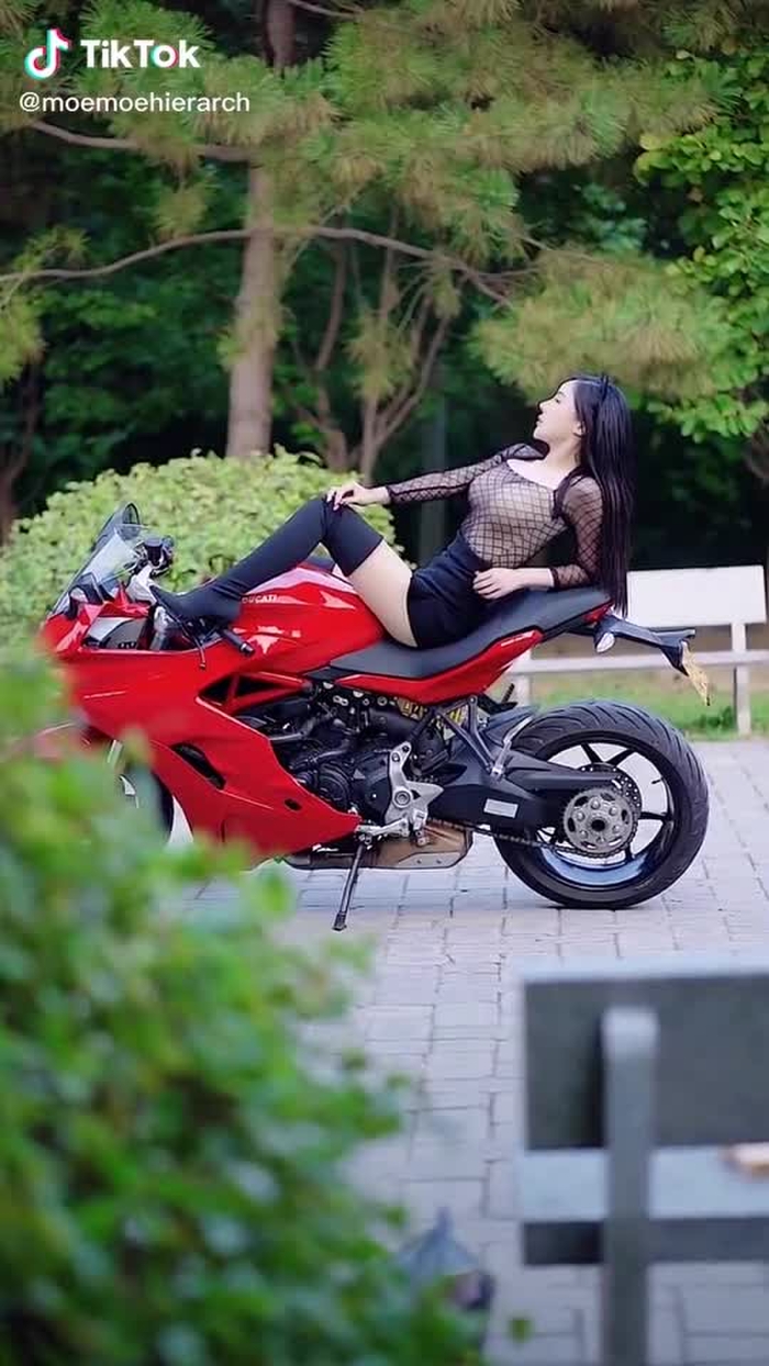 Do you like the car or the girl?