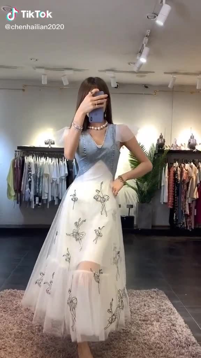 I like this white dress very much